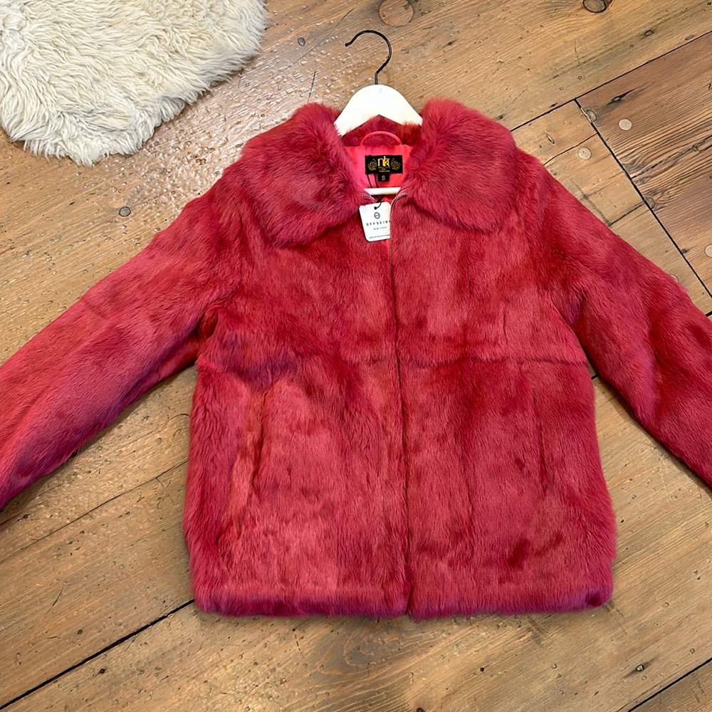 Fur jacket with zipper and elastic waist band